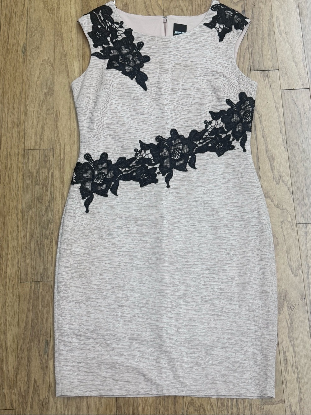 Sleeveless Cream Sheath Dress with Black Lace Appliqué